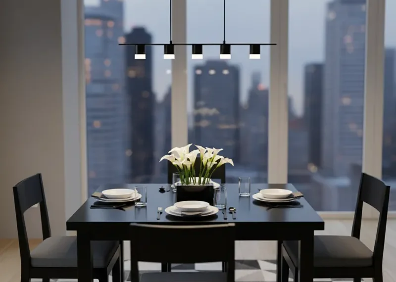 Sleek black square dining table with a minimalist design, perfect for a modern dining room or kitchen nook.