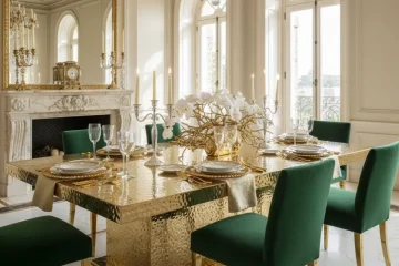 Luxurious gold dining table set for 6, featuring a modern design with sleek chairs and a polished finish, ideal for elegant dining rooms.