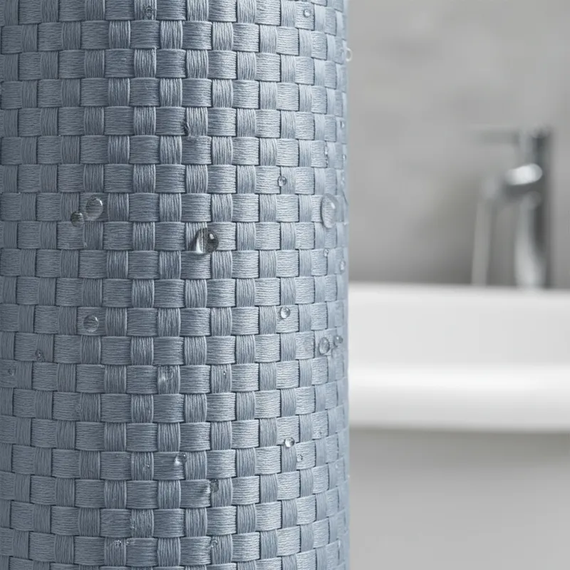 Close-up of a high-quality polyester shower curtain fabric, showing its weave and water-repellent texture.