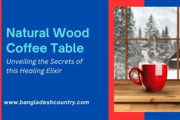 A steaming red coffee mug rests on a natural wood table, looking out onto a snowy winter landscape with pine trees and a distant cabin through a window. The image also displays text: 'Natural Wood Coffee Table', 'Unveiling the Secrets of this Healing Elixir', and 'www.bangladeshcountry.com'.