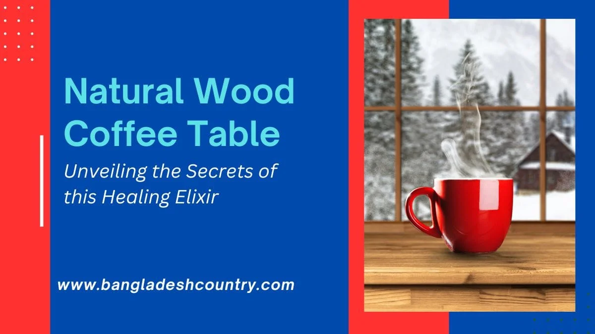 A steaming red coffee mug rests on a natural wood table, looking out onto a snowy winter landscape with pine trees and a distant cabin through a window. The image also displays text: 'Natural Wood Coffee Table', 'Unveiling the Secrets of this Healing Elixir', and 'www.bangladeshcountry.com'.