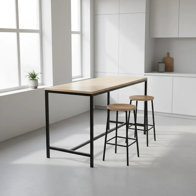 A sleek, modern rectangle bar height table in a minimalist kitchen, with two bar stools tucked neatly underneath. The table surface is light wood, and