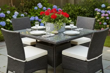 Square patio dining table for 4 people, ideal for outdoor meals and small gatherings.