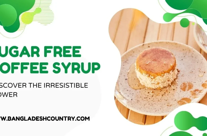 Advertisement for 'SUGAR FREE COFFEE SYRUP' in large green text, displayed alongside a layered dessert or pancake stack covered in coconut flakes and drizzled with syrup on a speckled plate. The image also includes the phrases 'DISCOVER THE IRRESISTIBLE POWER' and 'WWW.BANGLADESHCOUNTRY.COM'.