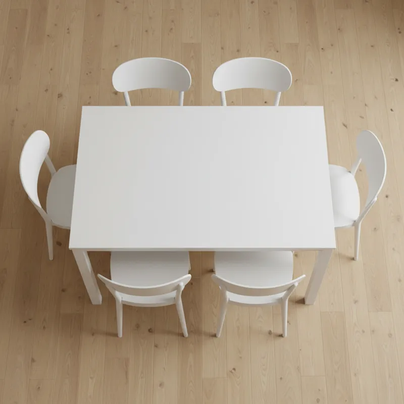 An overhead view of a white rectangular dining table with four matching white dining chairs neatly tucked underneath, showcasing the 5-piece setup.